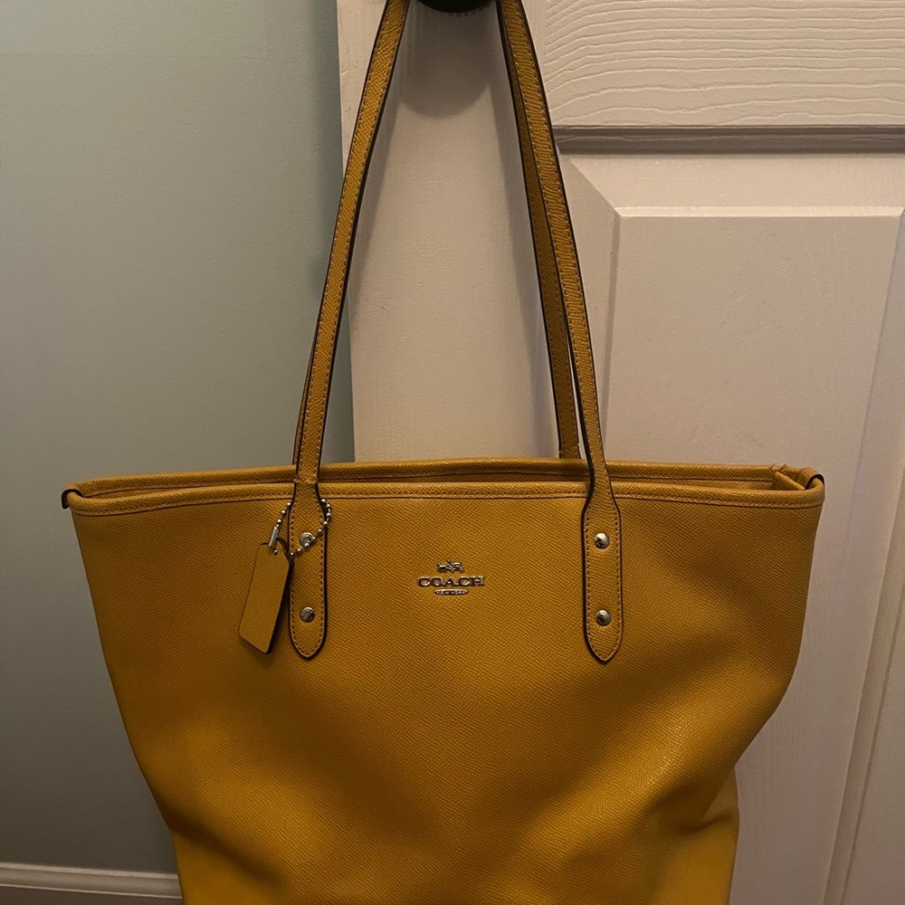 Coach mustard tote. Pre-loved but still has some life left
